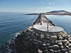 Søndre molo i Svartnes fiskerihavn i Vardø kommune skal rustes opp. Foto: Kystverket