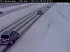 Trafikk på snødekt E16 ved Gardermoen. Foto: Statens vegvesen webkamera/NTB